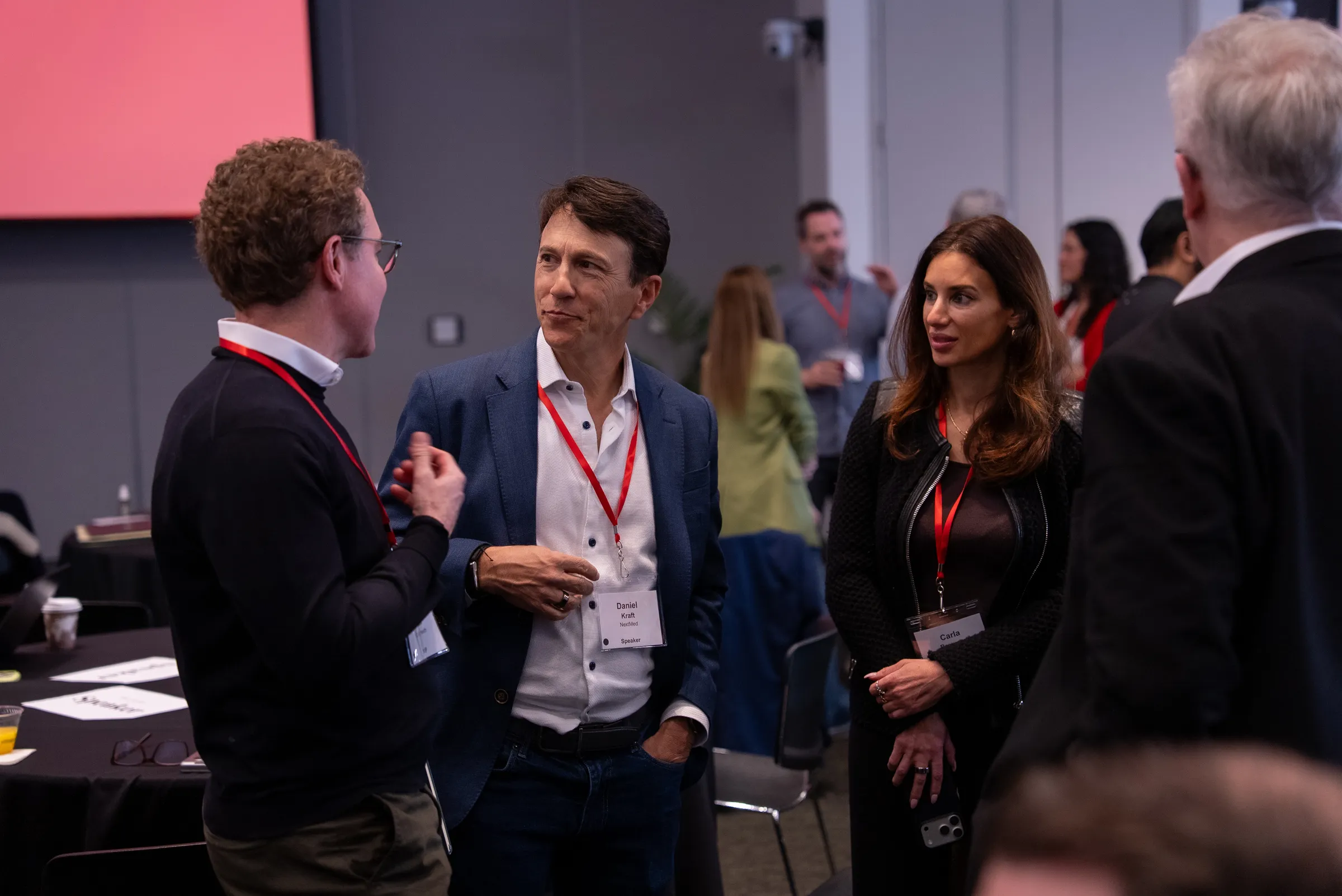 Speakers and attendees talking between sessions at SMCHC 2026